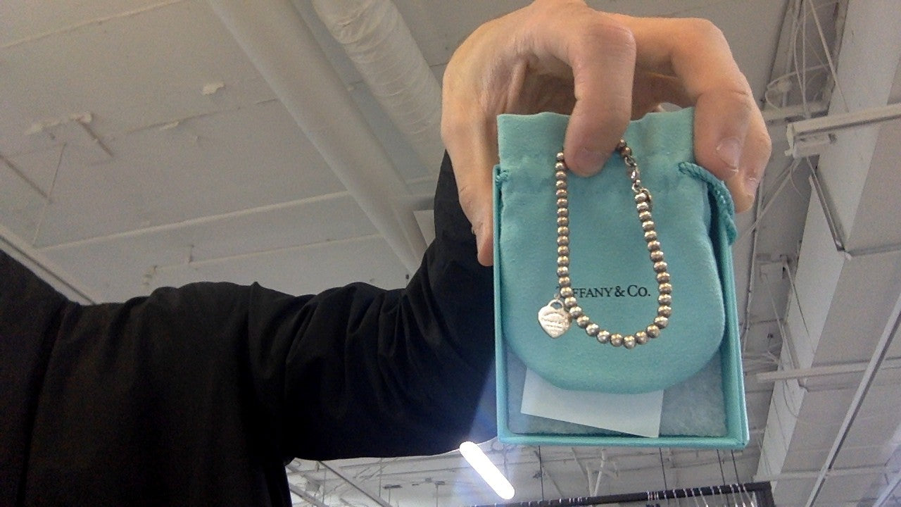 Tiffany & Co. ball bracelet w/ heart charm