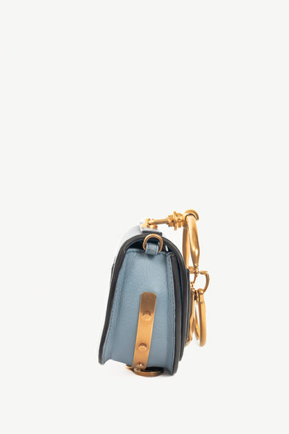 Chloe blue circle handle nile clutch