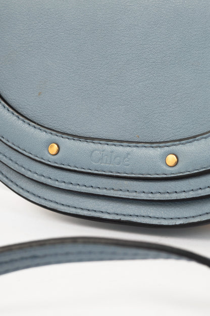 Chloe blue circle handle nile clutch