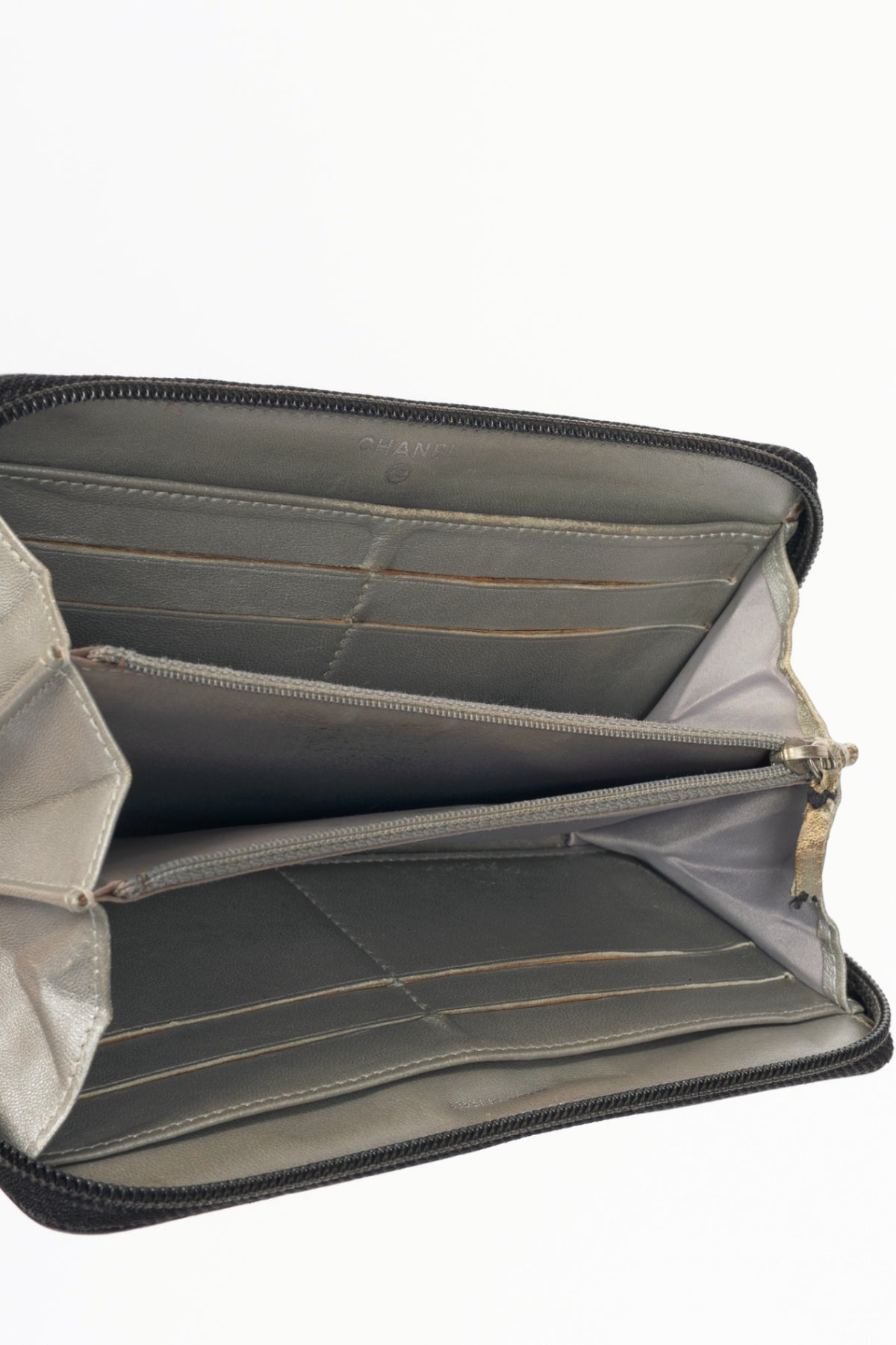 Chanel Black Camellia-Embossed Lambskin Zip Wallet
