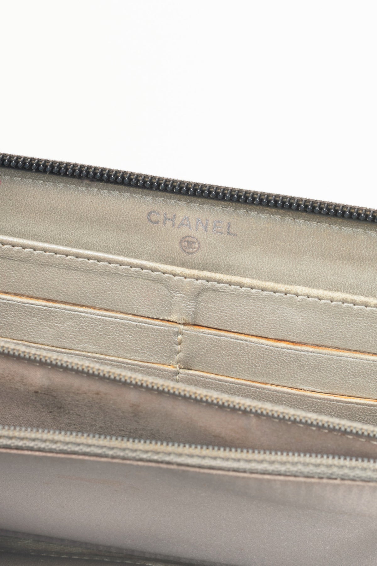Chanel Black Camellia-Embossed Lambskin Zip Wallet