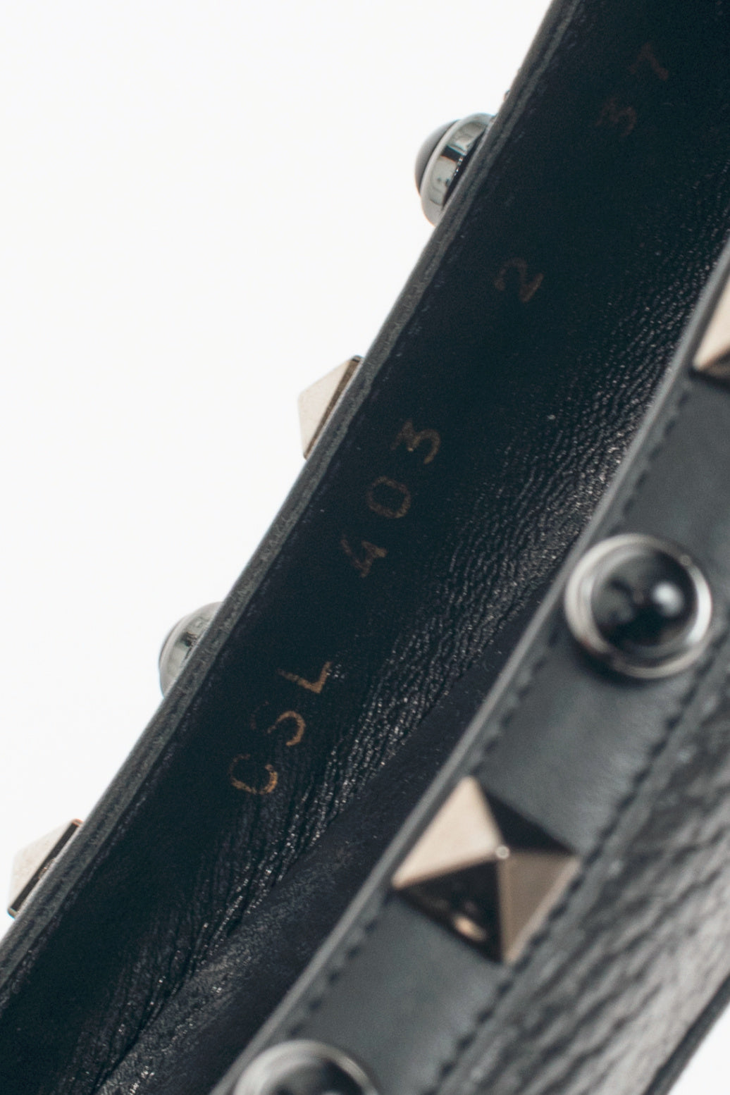 Valentino Garavani Noir Rockstud Rolling Pointed-Toe Flats