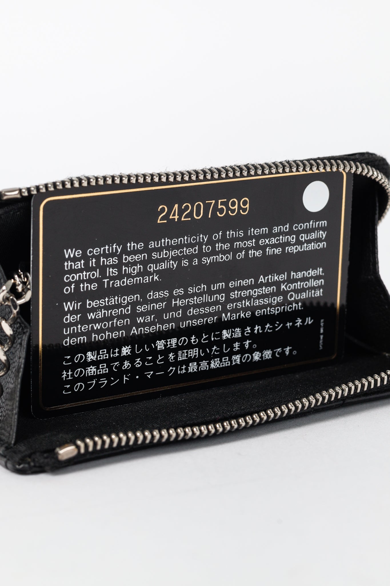 Chanel Black Caviar Leather Camellia-Embossed Key Holder