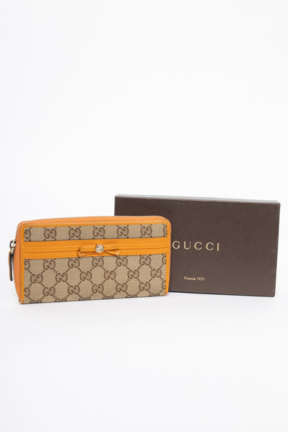 Gucci Beige & Ebony Orange-Trim GG Canvas Bow Wallet
