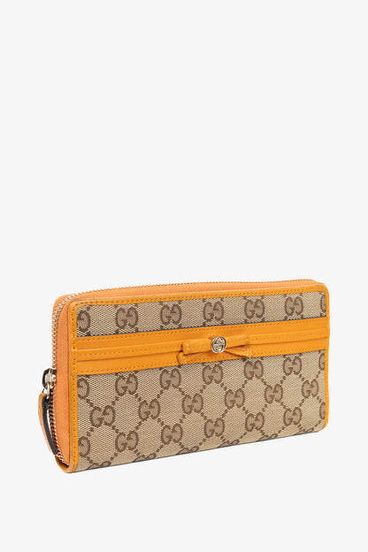 Gucci Beige & Ebony Orange-Trim GG Canvas Bow Wallet