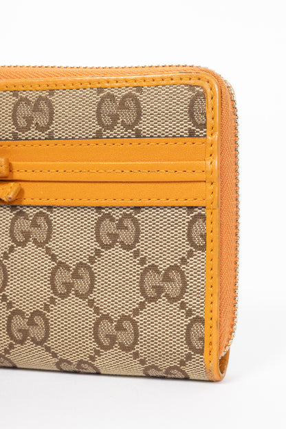 Gucci Beige & Ebony Orange-Trim GG Canvas Bow Wallet