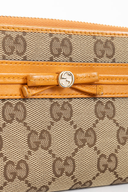 Gucci Beige & Ebony Orange-Trim GG Canvas Bow Wallet