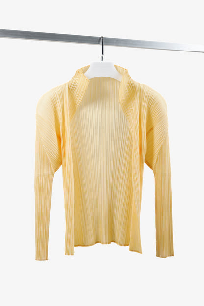 Pleats Please  Issey Miyake  Light Creamsicle Cardigan