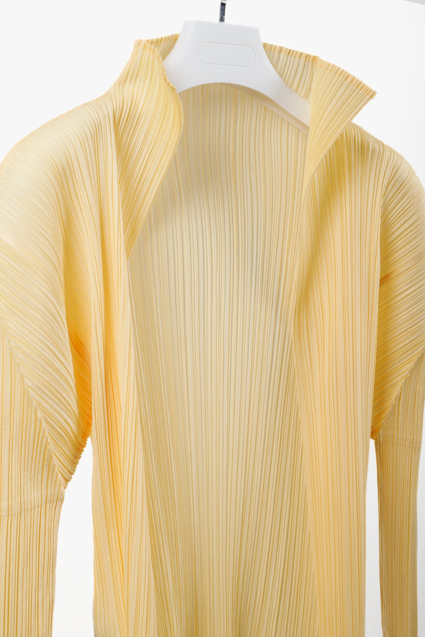 Pleats Please  Issey Miyake  Light Creamsicle Cardigan