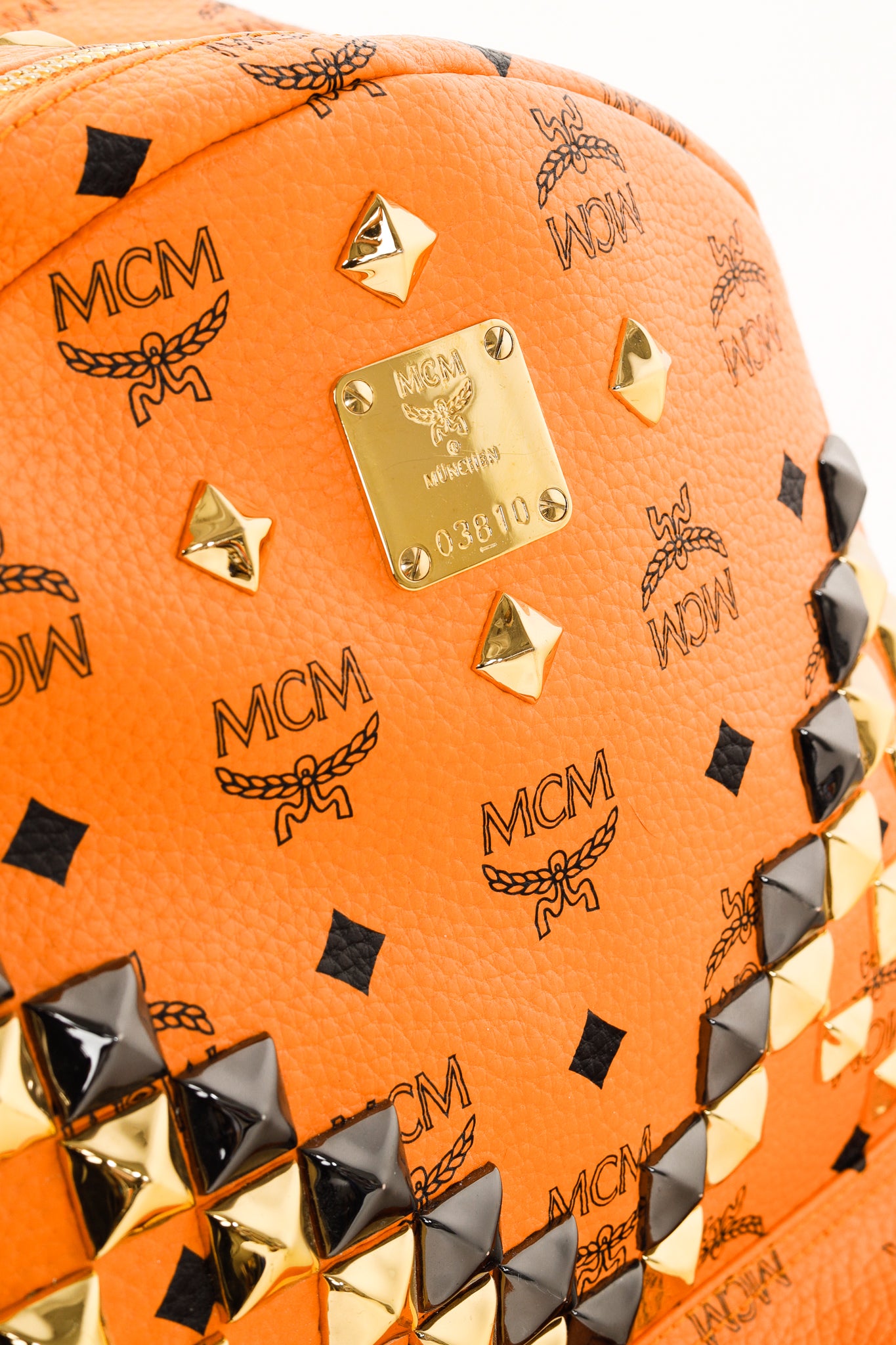 MCM Stark Metal Studs Orange Monogram Backpack