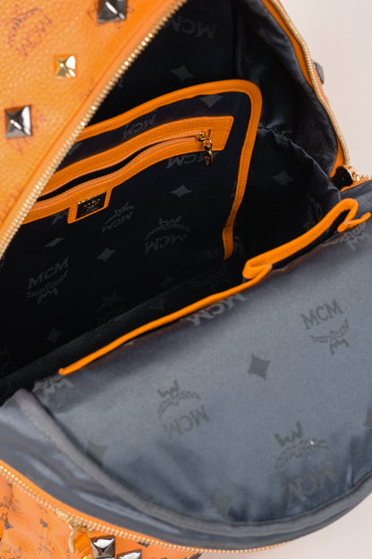 MCM Stark Metal Studs Orange Monogram Backpack