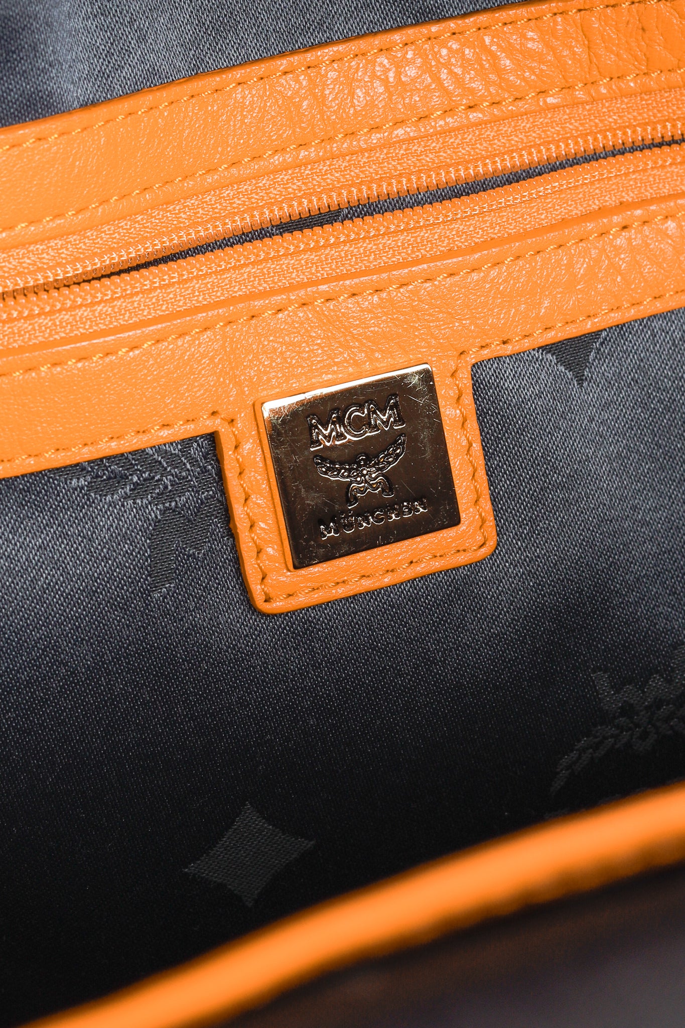 MCM Stark Metal Studs Orange Monogram Backpack