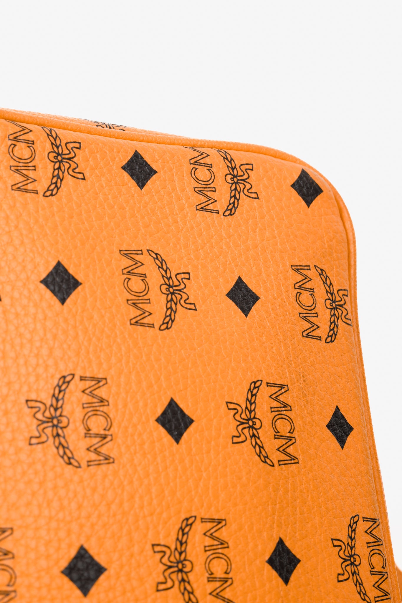 MCM Stark Metal Studs Orange Monogram Backpack