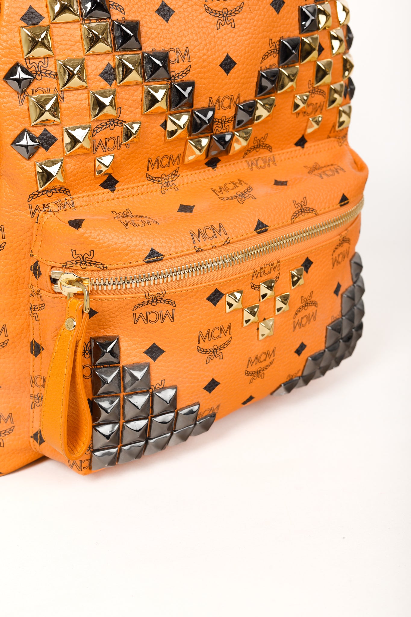 MCM Stark Metal Studs Orange Monogram Backpack