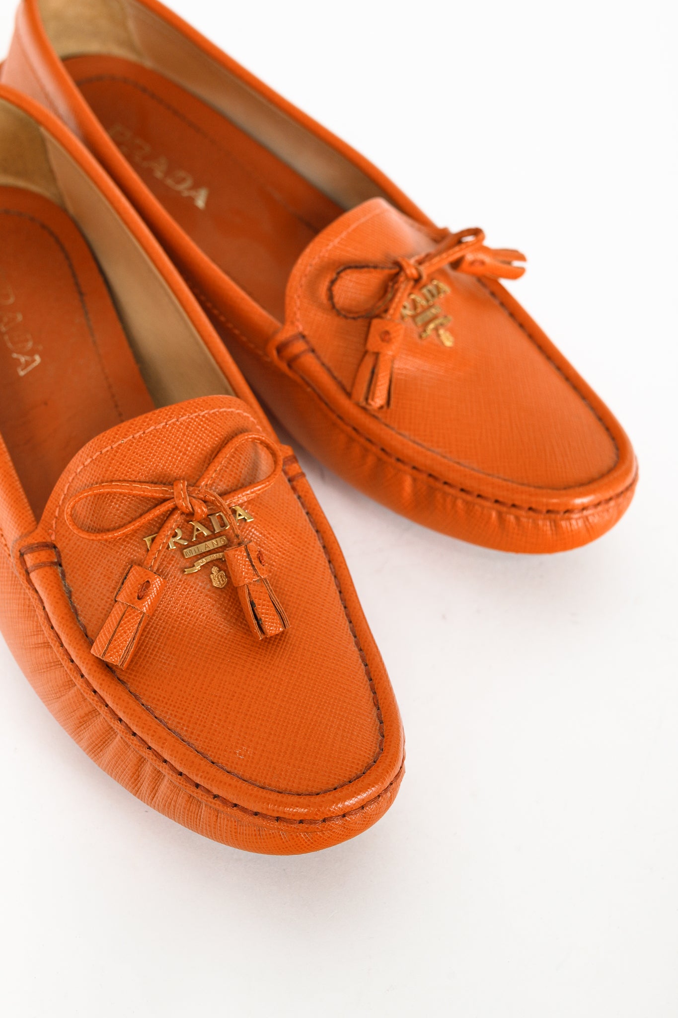 Prada Orange Saffiano Leather Tassel-Bow Loafers