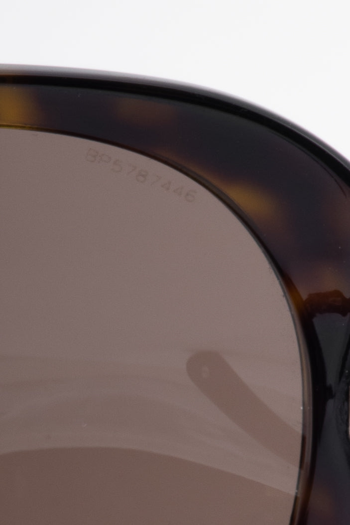 Prada SPR 08L Tortoiseshell Wavy-Arm Round Sunglasses